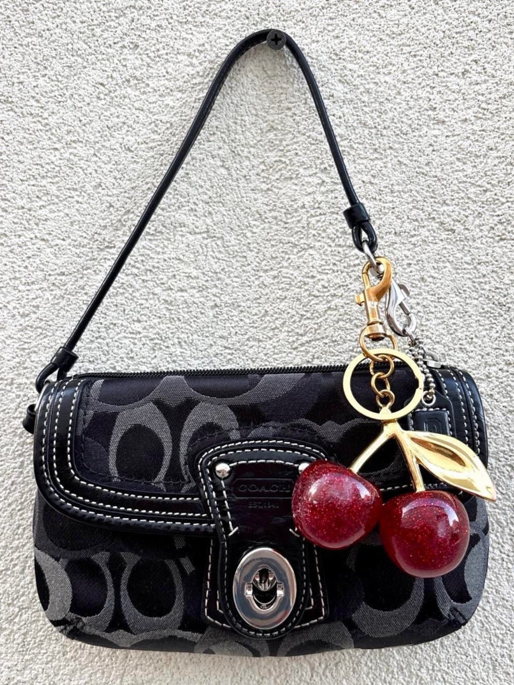 Coach Black Signature Canvas Mini Wristlet with Red Cherry Charm